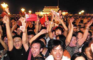 Chinese Celebrate in Beijing After IOC Decision